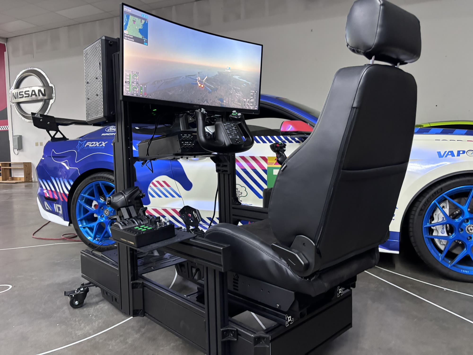 The complete Academy Sim Racing flight simulator rig with seat, screen and controls